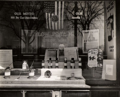 Window of Ludlow Post Office showing war display